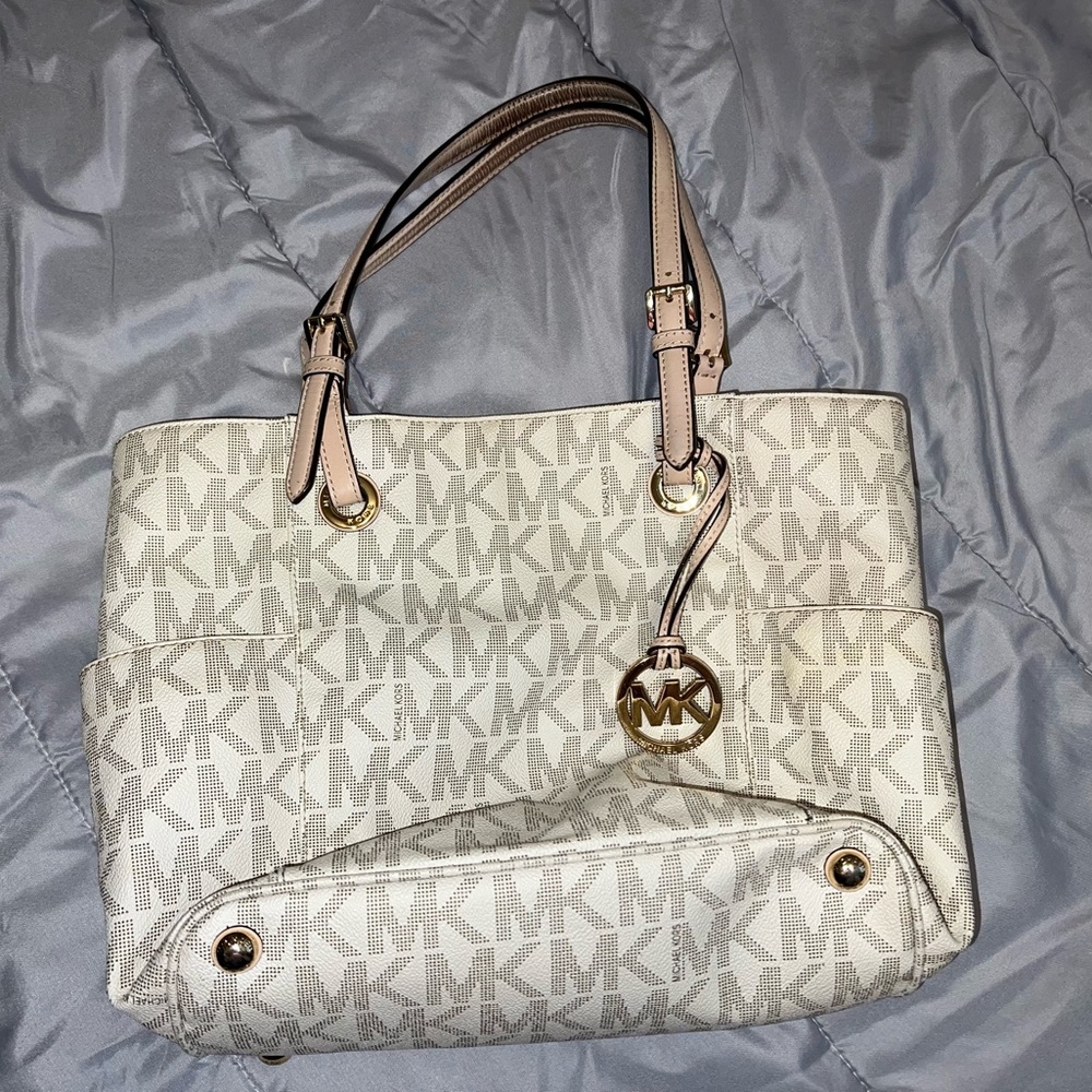 Michael Kors Jet set signature monogram tote.